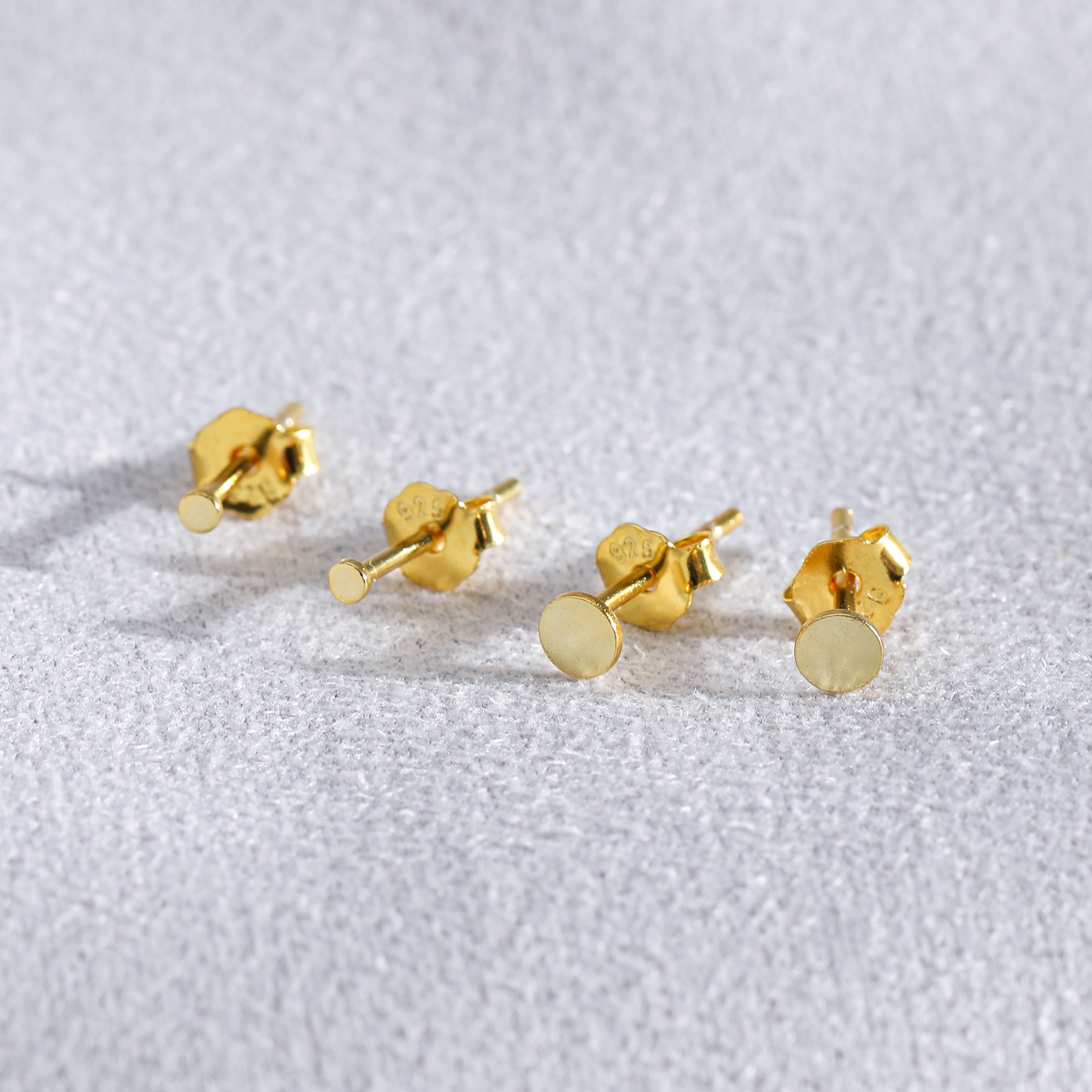 gold ear piercing earrings