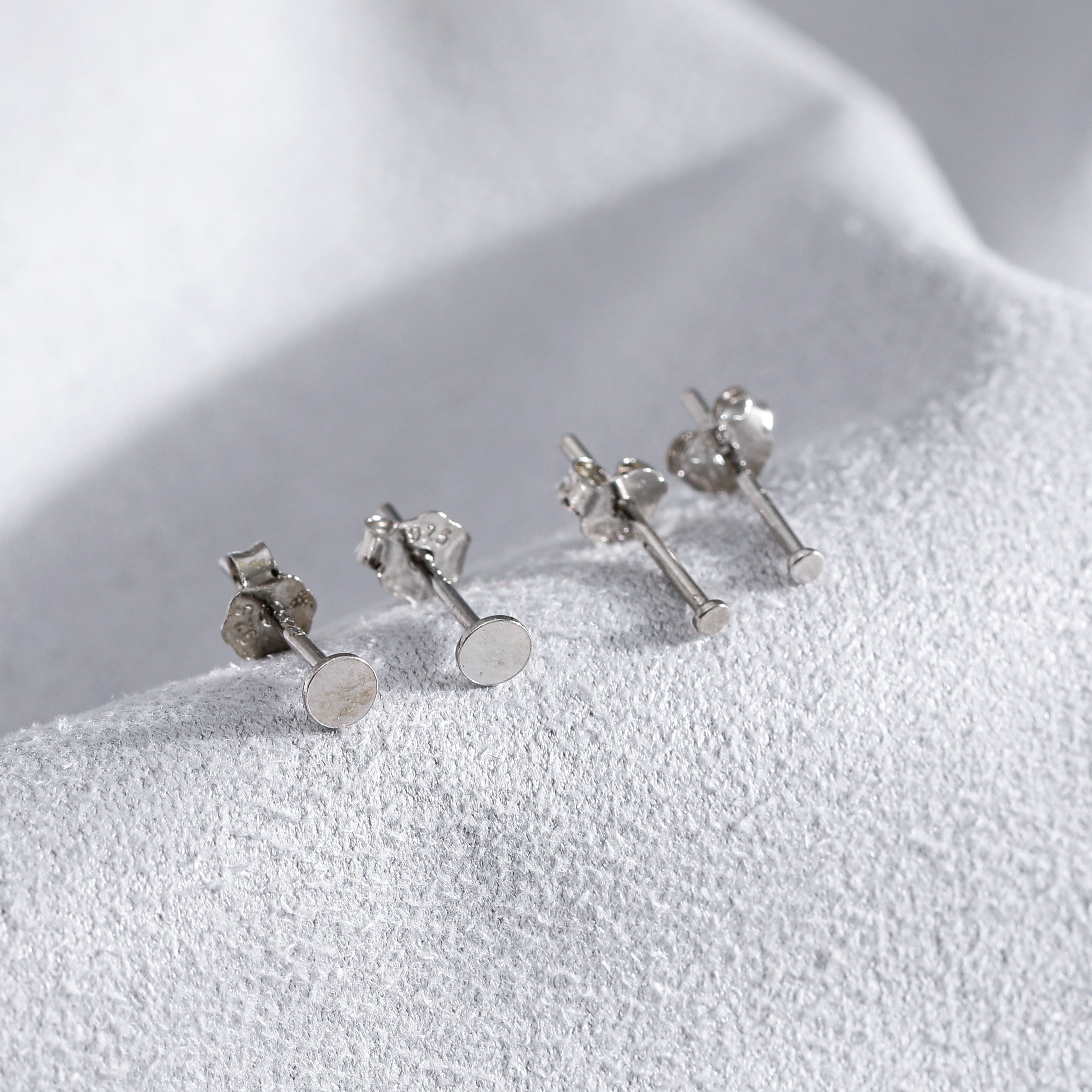 Tiny Silver circle studs for female