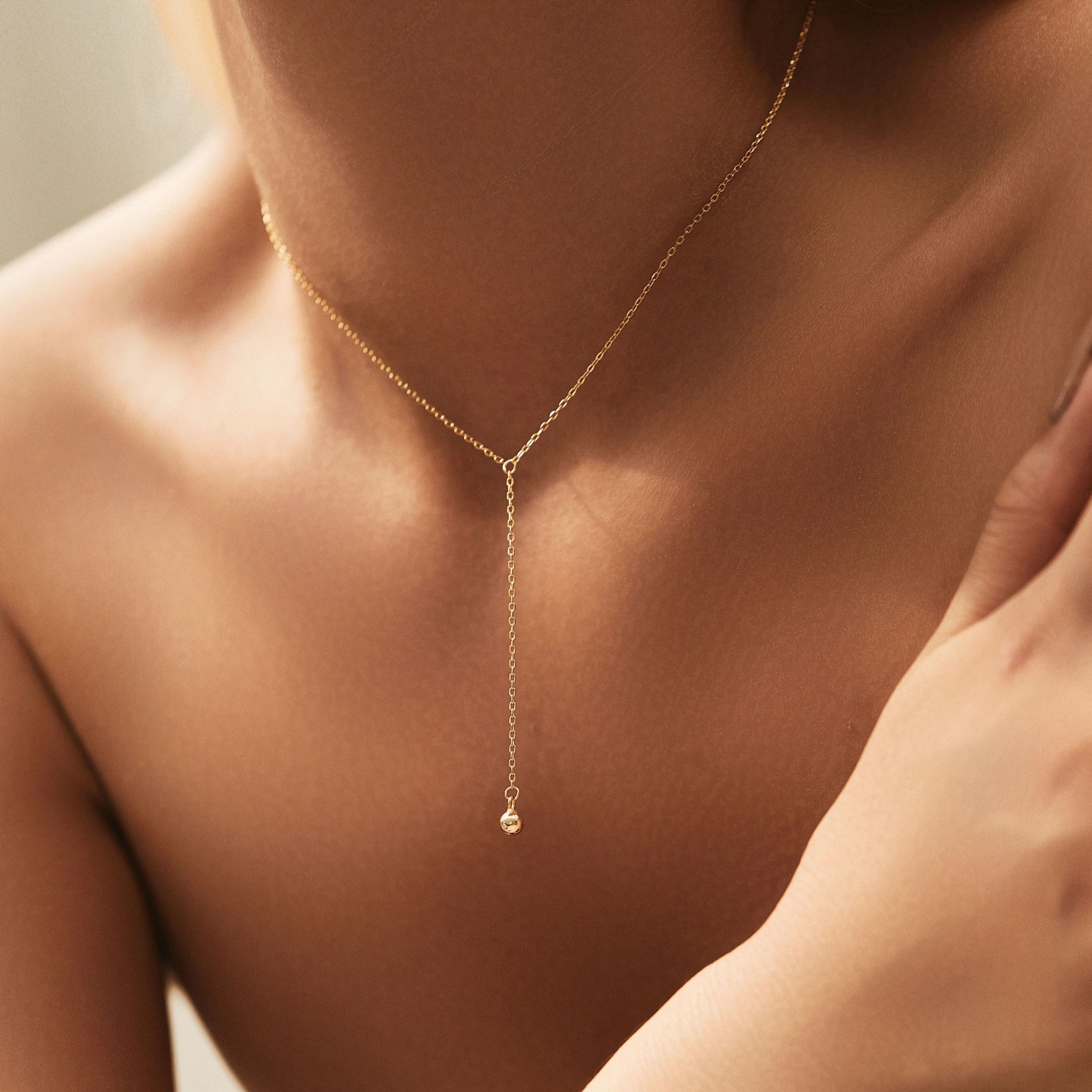 layered choker with ball charm