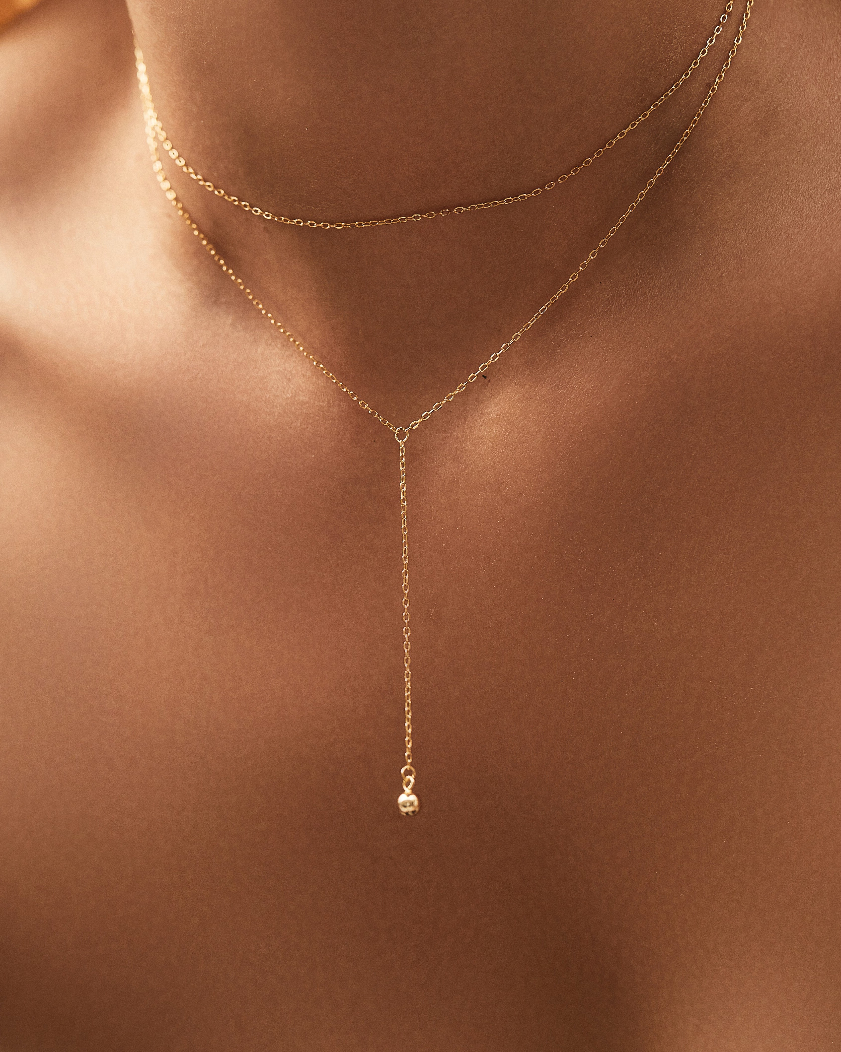 gold chain necklace layered