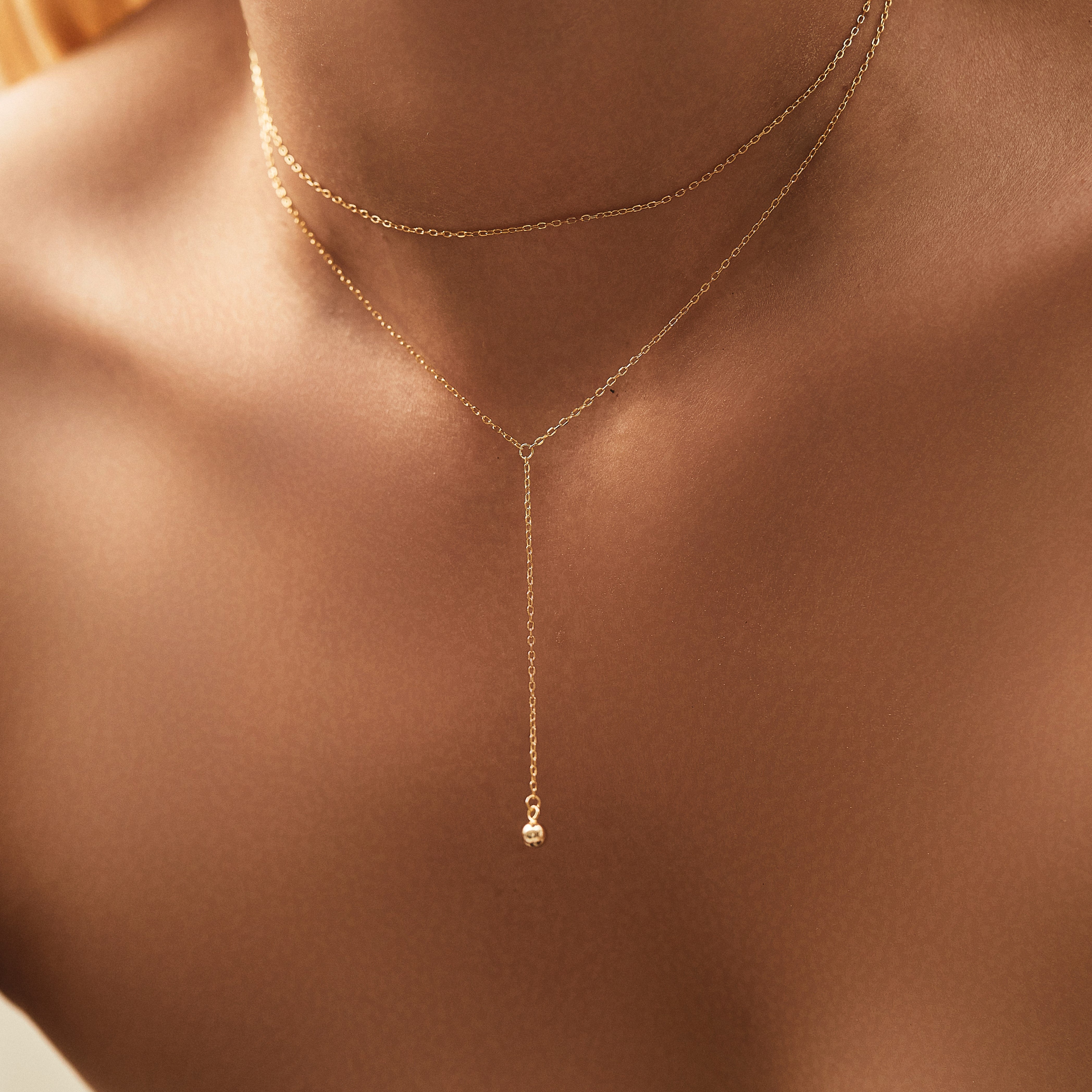 gold chain necklace layered