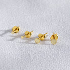 gold ear piercing earrings