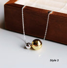 mixed metal ball necklace